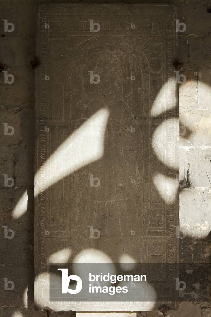 Cathedral (Cathédrale Notre-Dame). The cloister. A tombstone. Marguerite Moreau. 1551.
