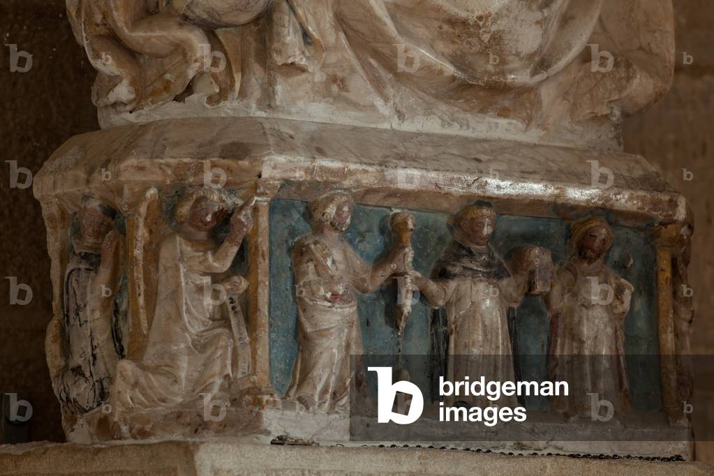 Parish church (Església Santa Maria del Castell de Cubells). Interior. Statue. Madonna with child. Detail the socle. Romanesque.