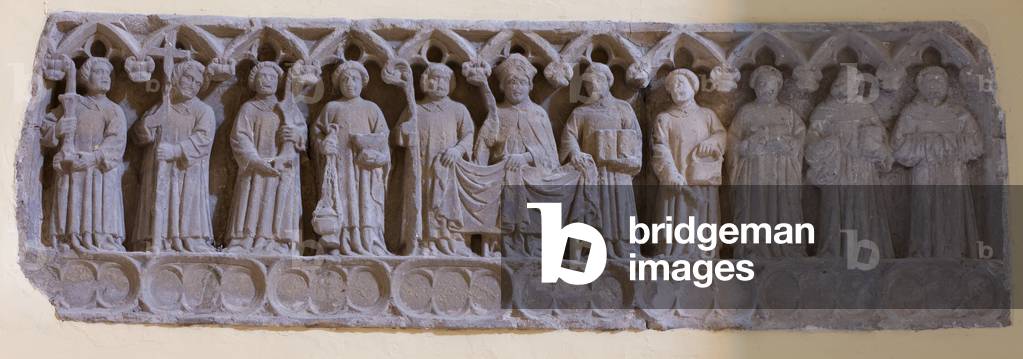 Parish church Església de Santa Maria. Interior. A chapel Capella de Sant Plàcid. A bas-relief. Grey stone. 14th century.