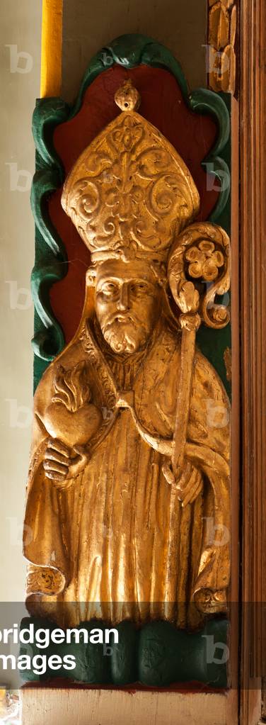 The chapel. sabot de poutre. Sclptured and painted. A saint or bishop?.