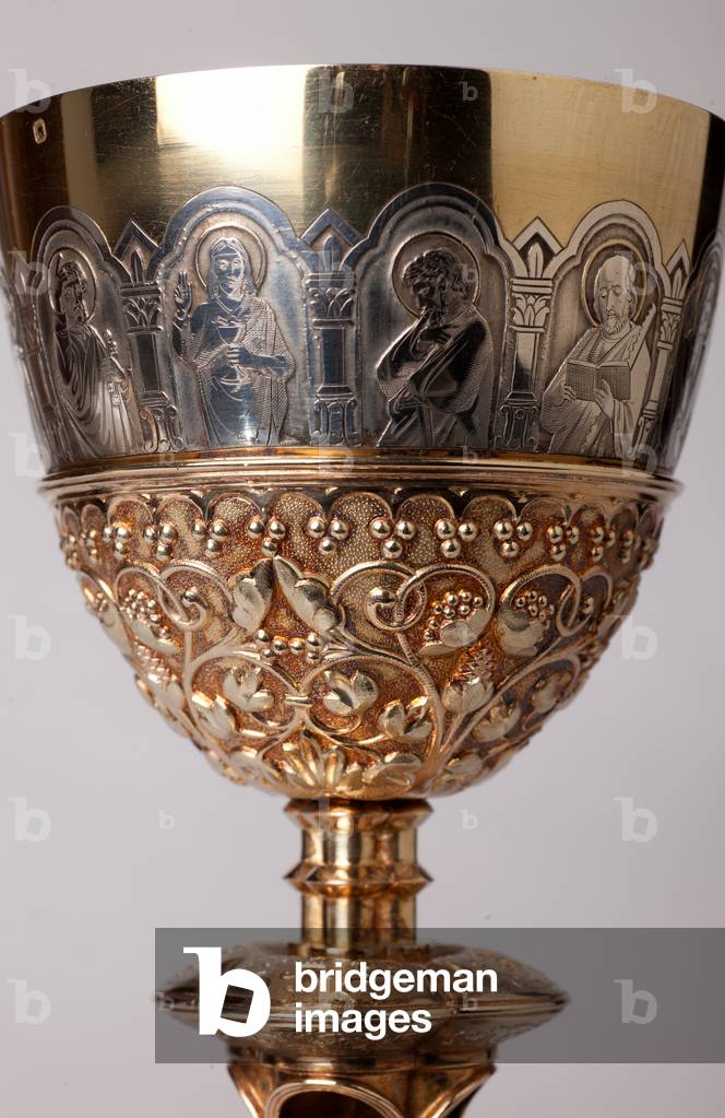 Chalice. Gold and silversmithing. Detail top with apostles engraved