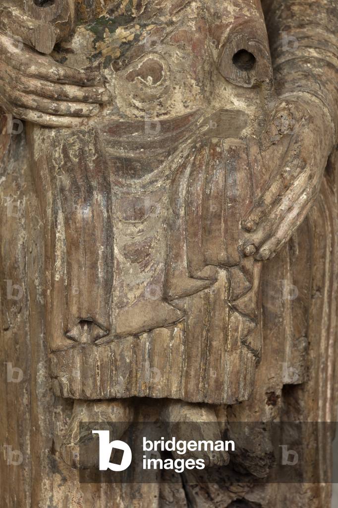 Statue Madonna with Child. Polychrome wood. Romanesque. Detail. The Child's torso.