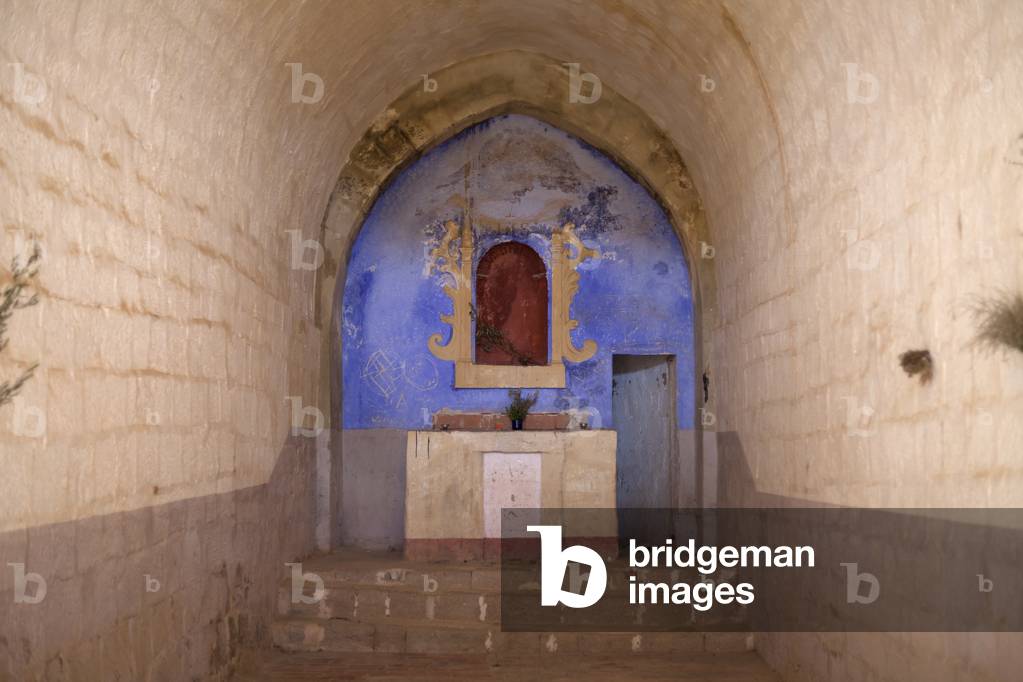 The chapel (Capella Sant Salvador del Coll  de l'Aguda). Interior.The former altar in ruin. 12th century.