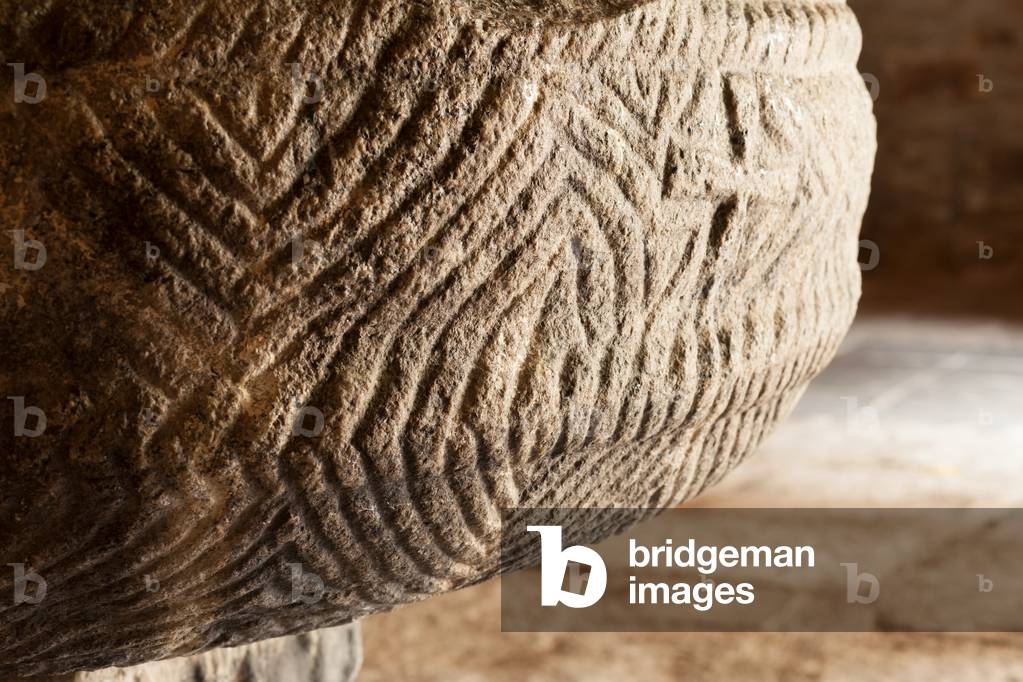 The church. Interior. The baptismal font. Detail.