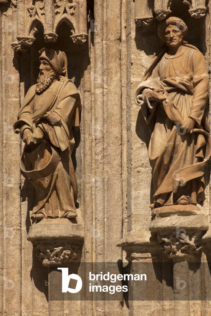 The cathedral. Exterior. East. Portal (Puerta de las Campanilas). Detail. Right doorjamb. Statues.