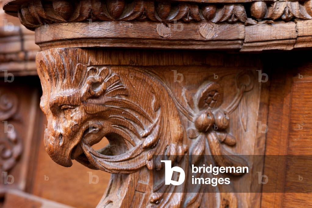 Collegiate church. Interior. Choir. Seating. Renaissance. Wood. Detail. Sculpture.