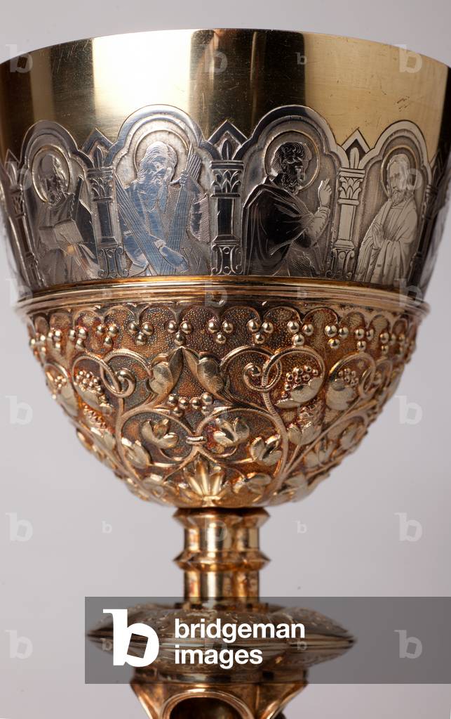 Chalice. Gold and silversmithing. Detail top with apostles engraved