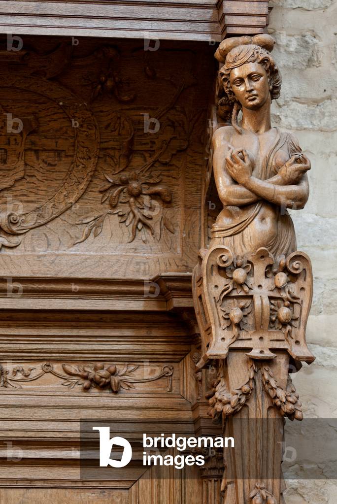 Collegiate church. Interior. Choir. Seating. Renaissance. Wood. Detail. Sculpture. Atlas.