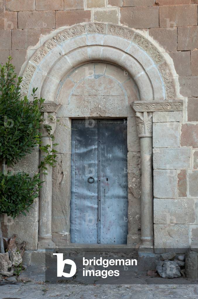 Parish church (Església de Torredenegó). Exterior. Entrance portal. Romanesque.
