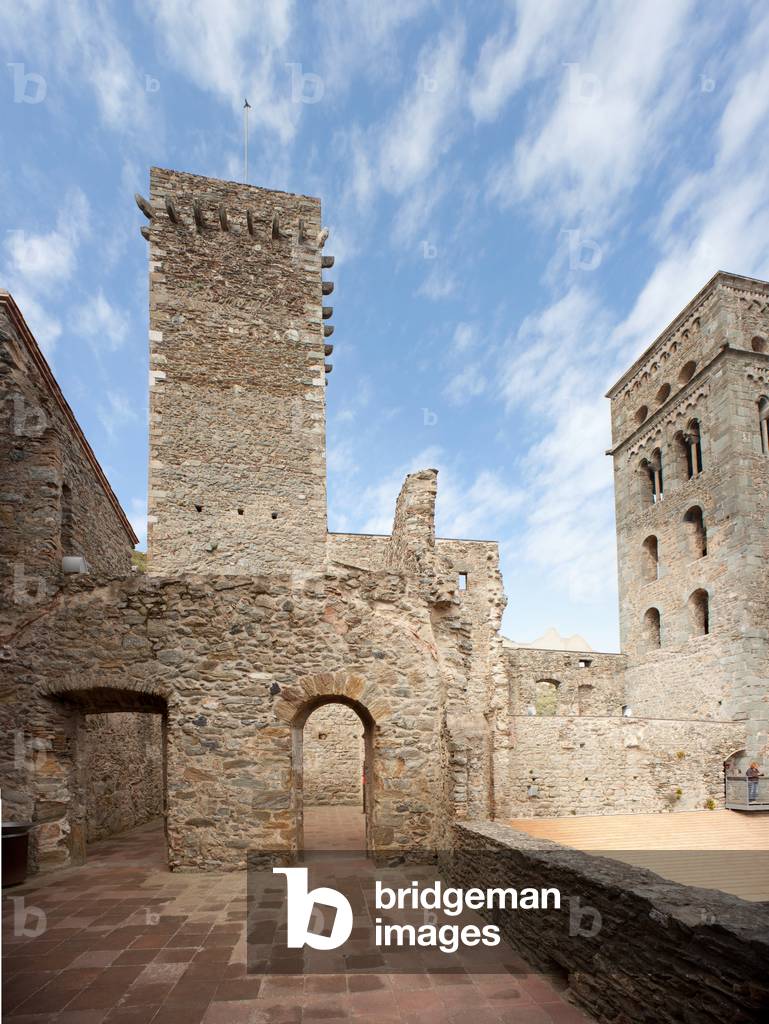 Monastery (Monestir de Sant Pere de Rodes). The cloister. The square tower.