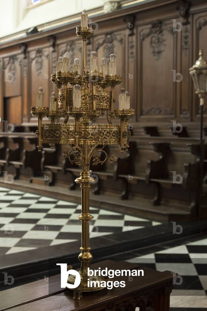 Collegiate church (Sint-Hermeskerk). Interior. A candlestick. Neo-Gothic.
