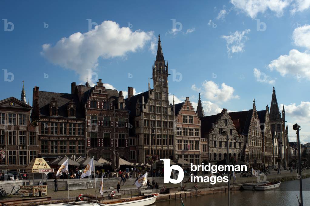 Graslei. The site with historic house façades, and the river (Leie).
