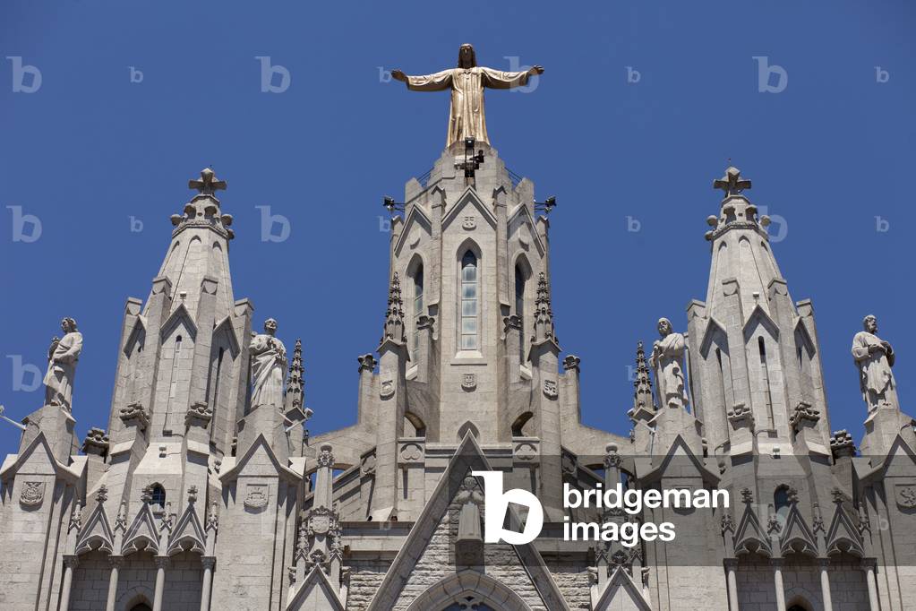 City site mount Tibidabo. The basilic church Holy hearth (Església de Sagrat Cor). Exterior. The façade. Detail the towers. Neo-Gothic.