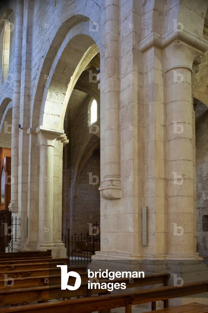 Monastery (Monestir de Poblet). The church. Interior. The nave. Detail. North wall. Columns. Romanesque. 12th century.