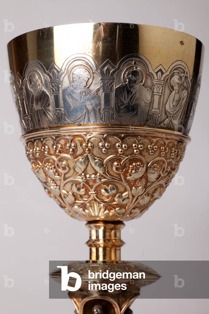 Chalice. Gold and silversmithing. Detail top with apostles engraved