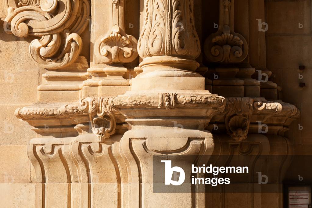 Sanctuary (Cova de Sant Ignasi). The church. Exterior. West façade. The entrance porch. Detail. Bottom of pilasters. Baroque. 18th century.