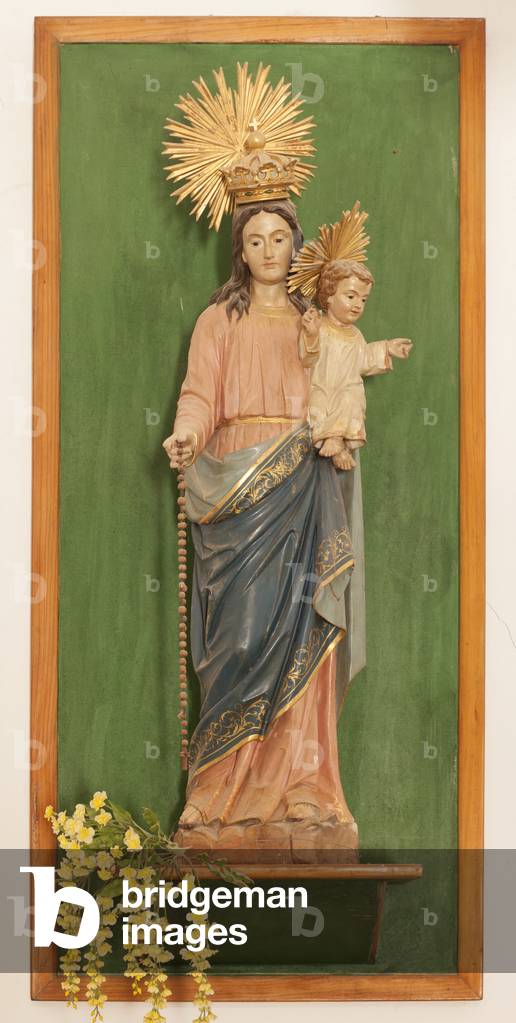 Parish church. Interior. A statue. Modonna with Child.