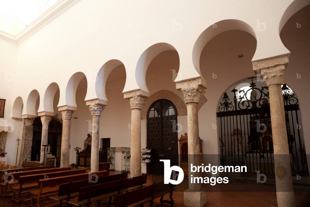 Church (Iglesia del Salvador). Interior. The nave. South wall. Horse-shoe archs.