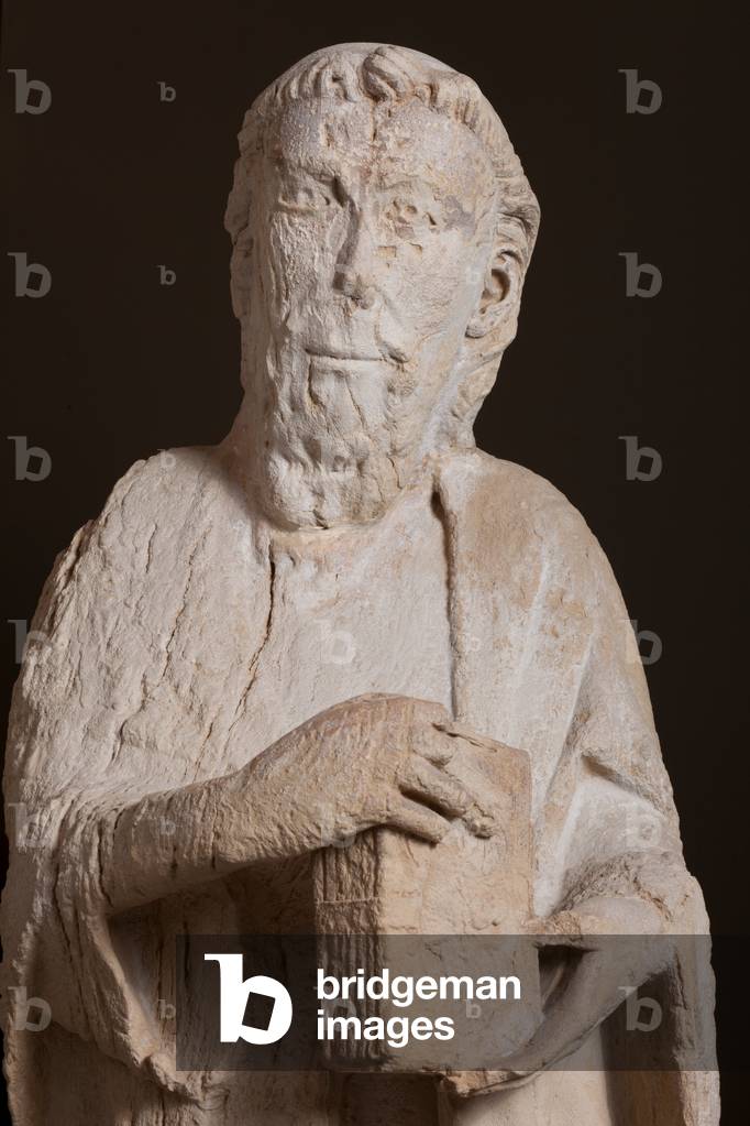 Museum Museu Comarcal de l'Urgell. Ensemble of five statues of apostles. Origin of the portal of the former church Santa Maria de Tàrrega portal. Detail. An apostle bust. 1319. Museum ref MCUT 2808,.