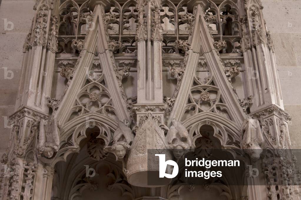 Basilica (Basilique Saint-Seurin de Bordeaux). Interior. Chaire, seat of an abbot. Sculpted stone.