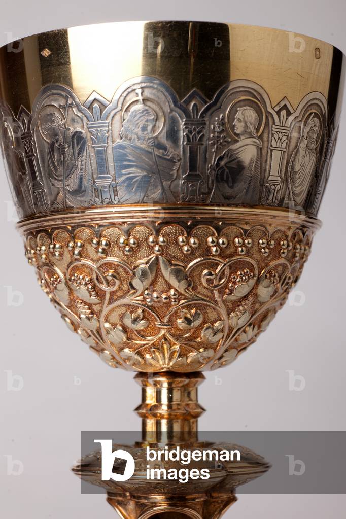 Chalice. Gold and silversmithing. Detail top with apostles engraved