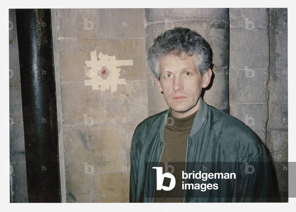Michael Clark standing next to one of his 'Wounds' during their installation in Chichester Cathedral, Easter 1994 (photo)