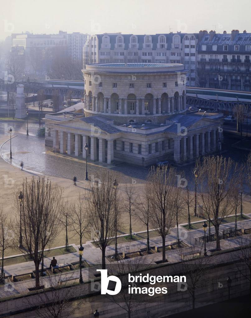 Rotunda by Claude Nicolas Ledoux (1736-1806) Place Stalingrad, Paris 75019. It is one of the four remains of the enclosure of the Farmers Generaux with that of the Monceau parks, Denfert Rochereau and the columns of the Trone. Built in 1786, this rotunda evokes the Rotonda de Palladio in Vicenze (Italy). This barrier served as a gendarmerie barracks from 1830 to 1860, and then as a storage room for salt. Restauree under the direction of Bernard Huet, it is now occupied by the Commission du Vieux Paris.