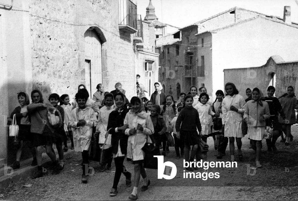 Group of children (girls) in the streets of a village in Andalusia. 1984