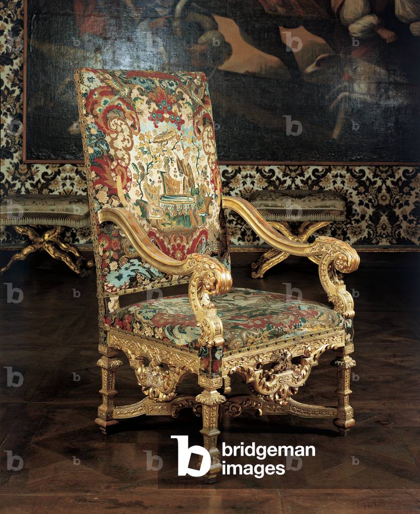 Armchair, (wood carved gilded and partially painted, padded seat, back and sides covered with silk)