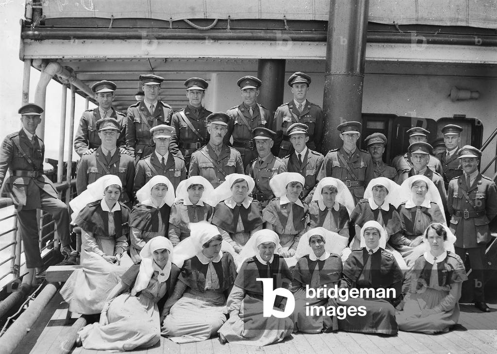 Group portrait of the Senior Medical Officers and staff aboard HMAT Wahehe, during the return voyage to Australia, September 1919-October 1919 (b/w photo)
