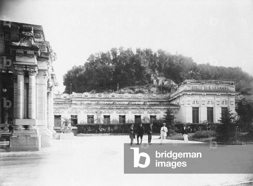 Men in front of the San Germano's Stoves at the Agnano Spa, Naples, Italy