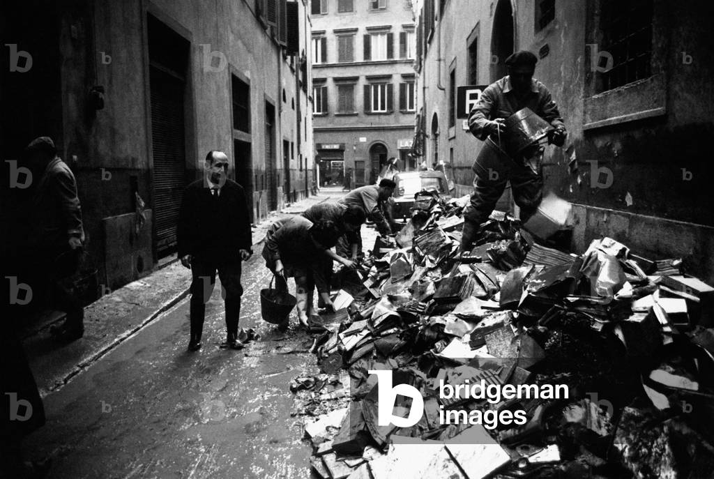 Volumes of Florence Del Re Library damaged by the flood