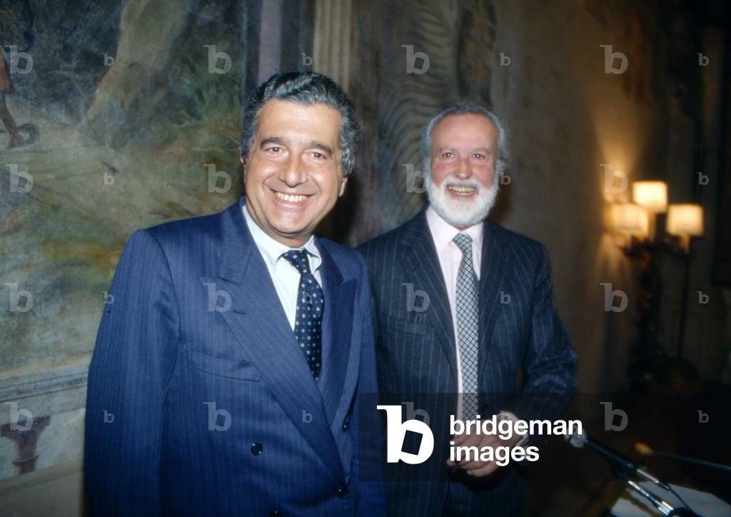 Eugenio Scalfari and Carlo De Benedetti smiling, 1990 (photo)