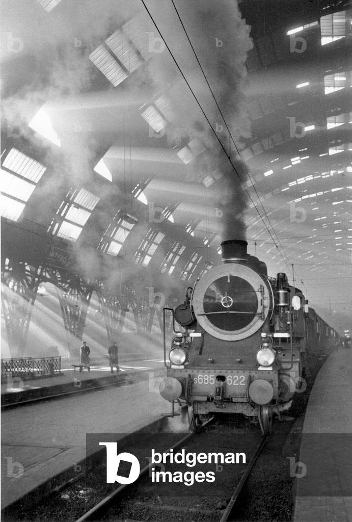 A train in the Central Station of Milan, Italy, 1950 (b/w photo)