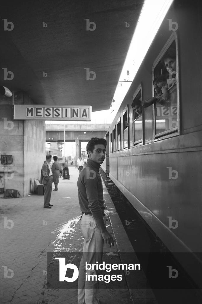 A southern emigrant on the platform of the Messina railroad station
