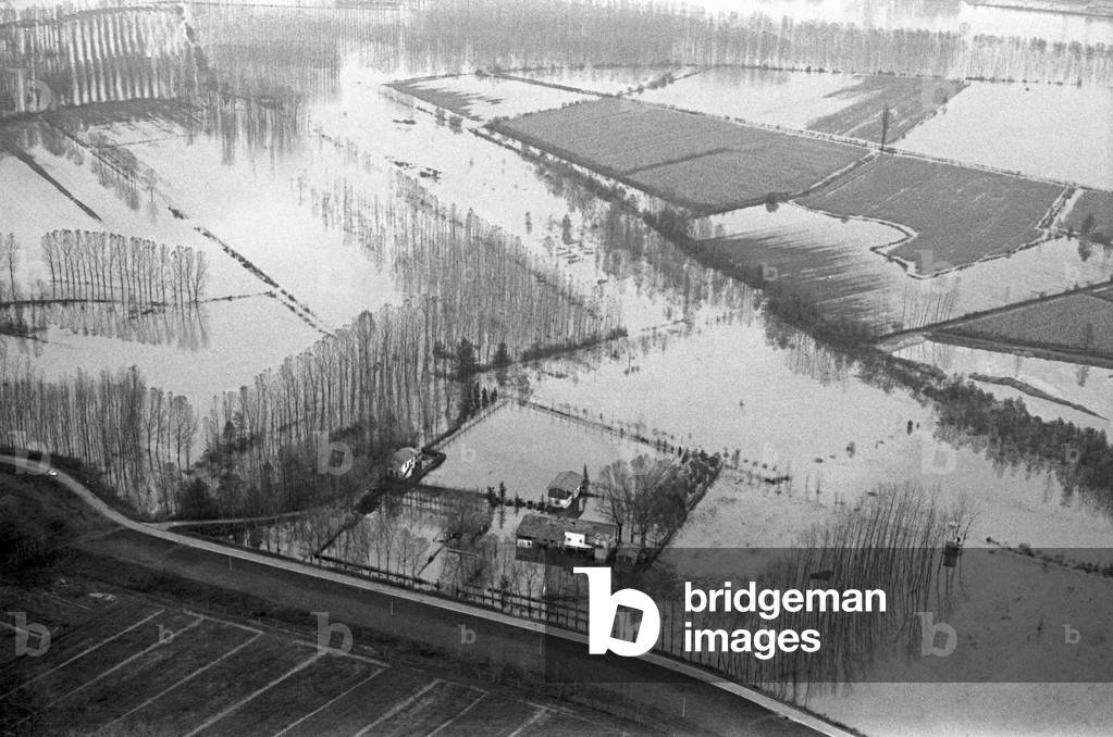Aerial view of the areas affected by the flood, Piedmont, Italy, 20th November 1968 (b/w photo)