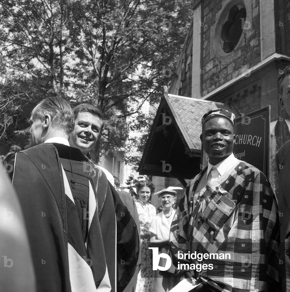 People smiling in front of the Emmanuel Church in Geneva, Geneva, Switzerland
