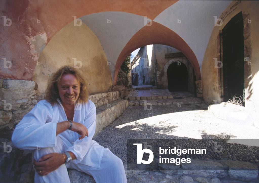 Umberto Tozzi under a porch