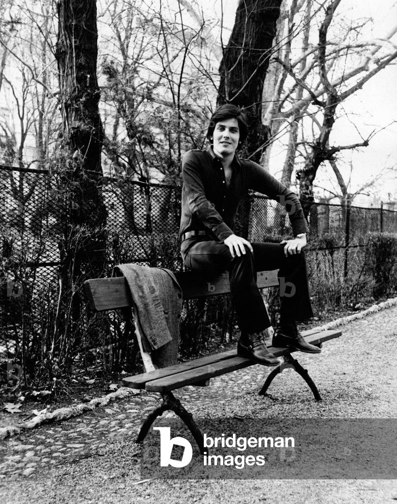 Paolo Giusti sitting on a bench