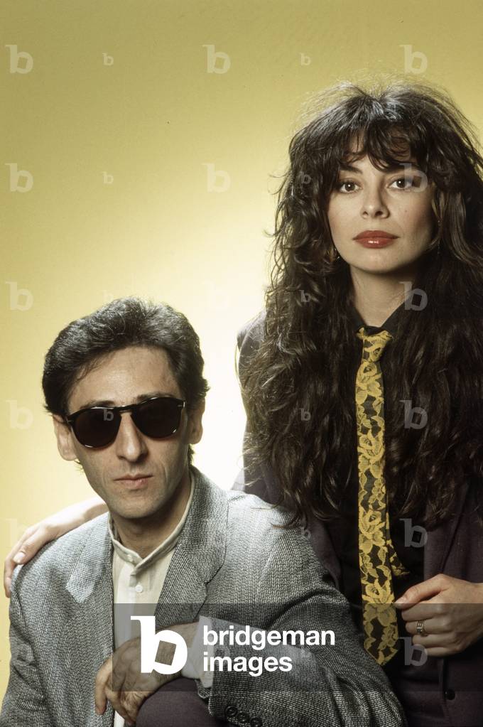 Portrait of Franco Battiato and Alice wearing a tie