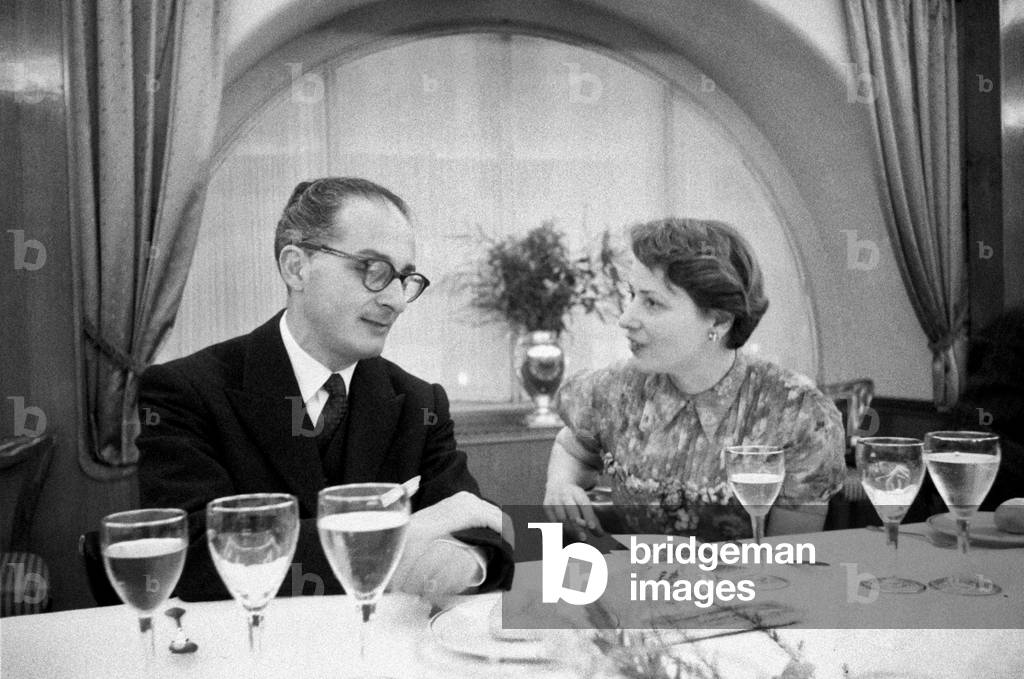 Two people sitting at a table