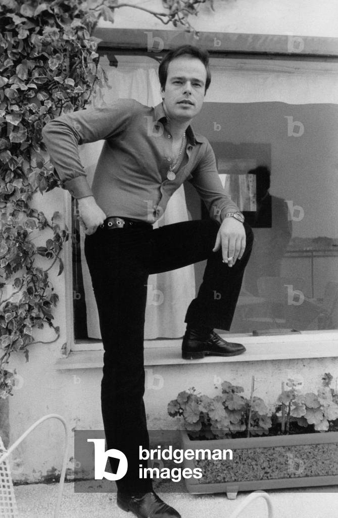 Dino with a cigarette between his fingers