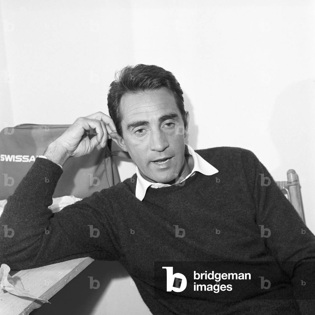 Walter Chiari seated, Italy, 1963 (b/w photo)