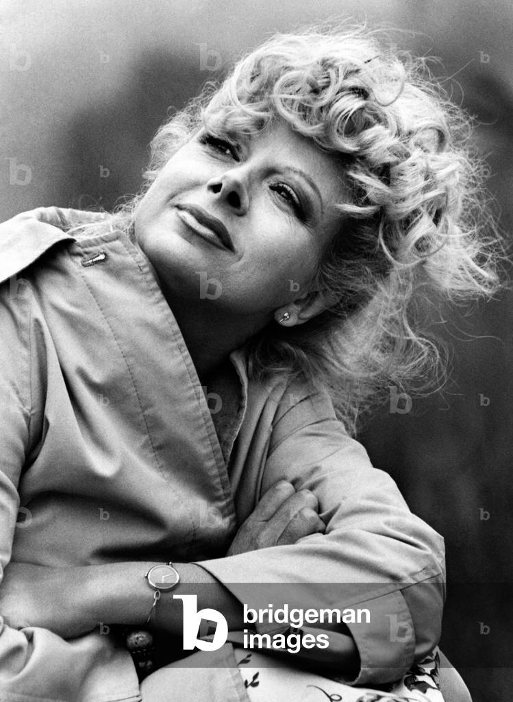 Portrait of Sandra Milo in a raincoat