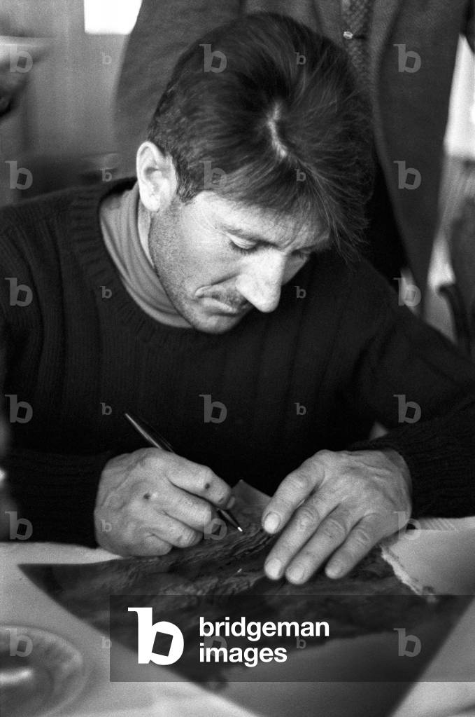 Walter Bonatti autographing a picture, Zermatt, Switzerland