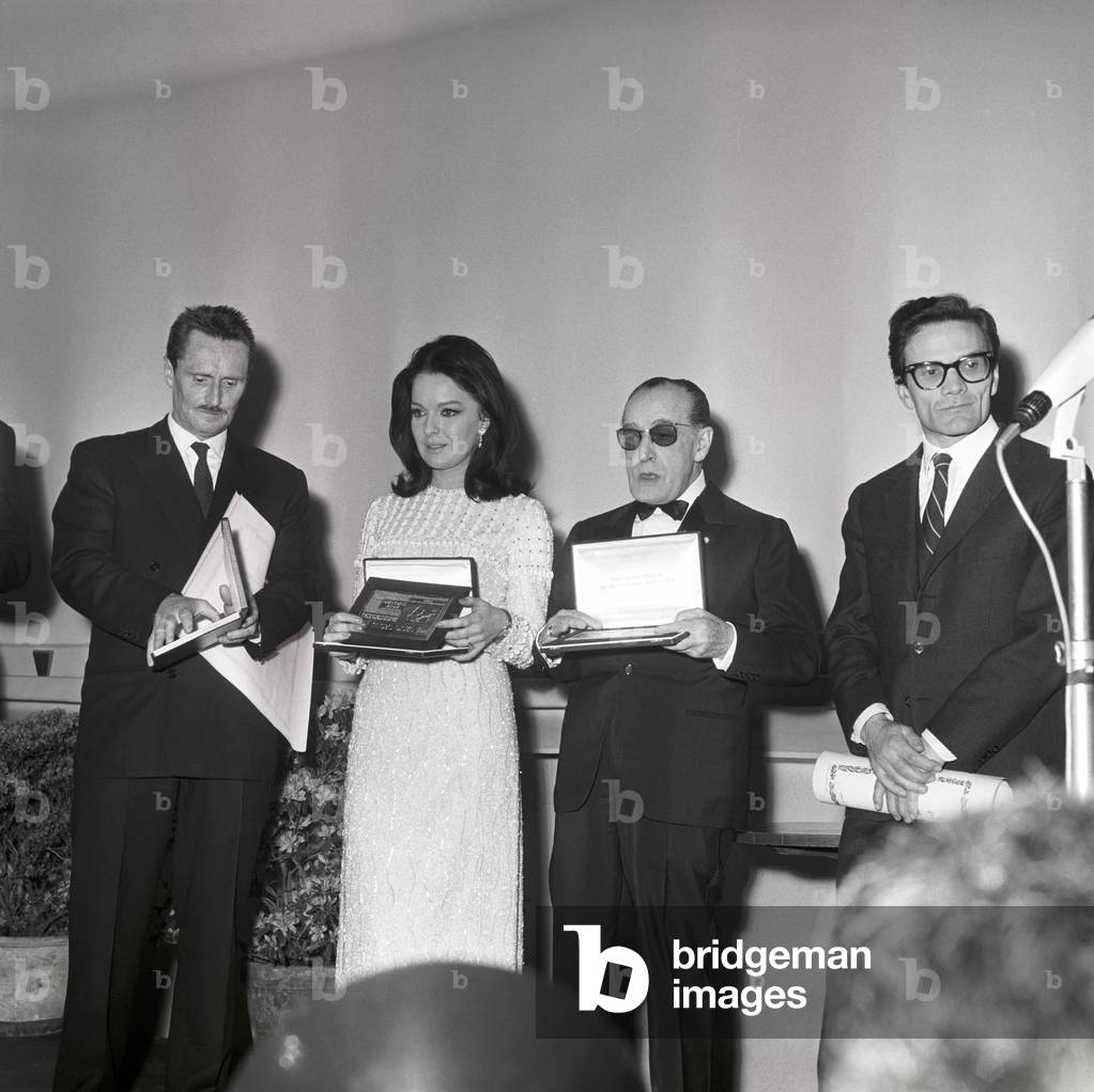 Pier Paolo Pasolini, Pietro Germi, Lisa Gastoni and Totò getting the Globo d'oro award, Italy, 1967 (b/w photo)