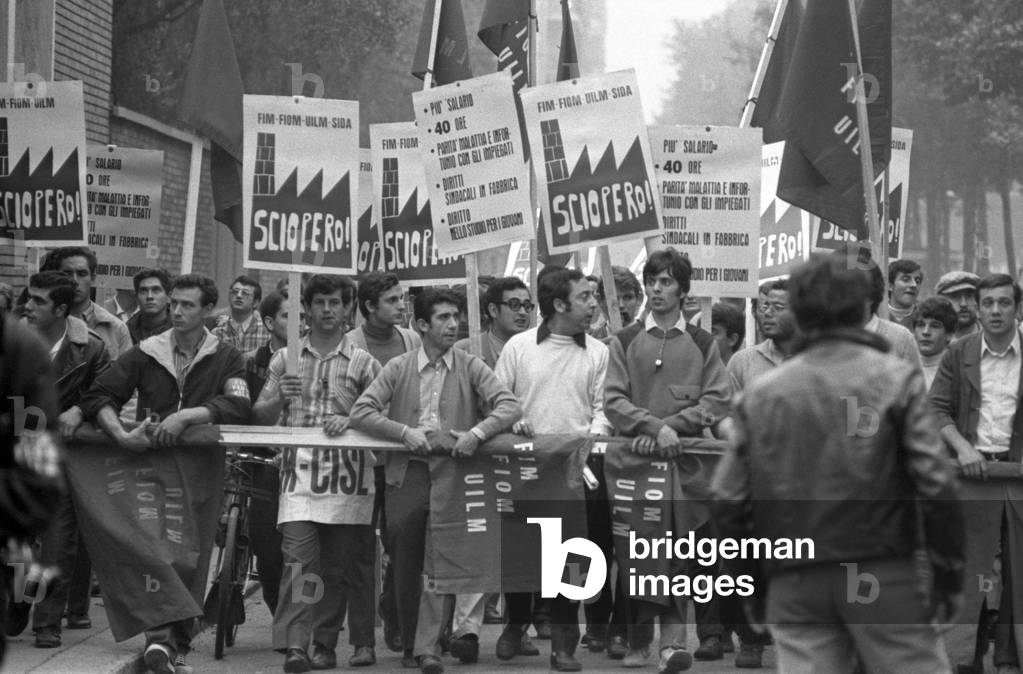 FIOM, FIM and UILM workers marching during a metalworkers' demonstration, Turin, 1969 (b/w photo)