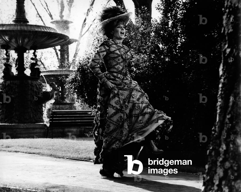 Barbra Streisand dancing dressed in stage costume, 1968 (b/w photo)