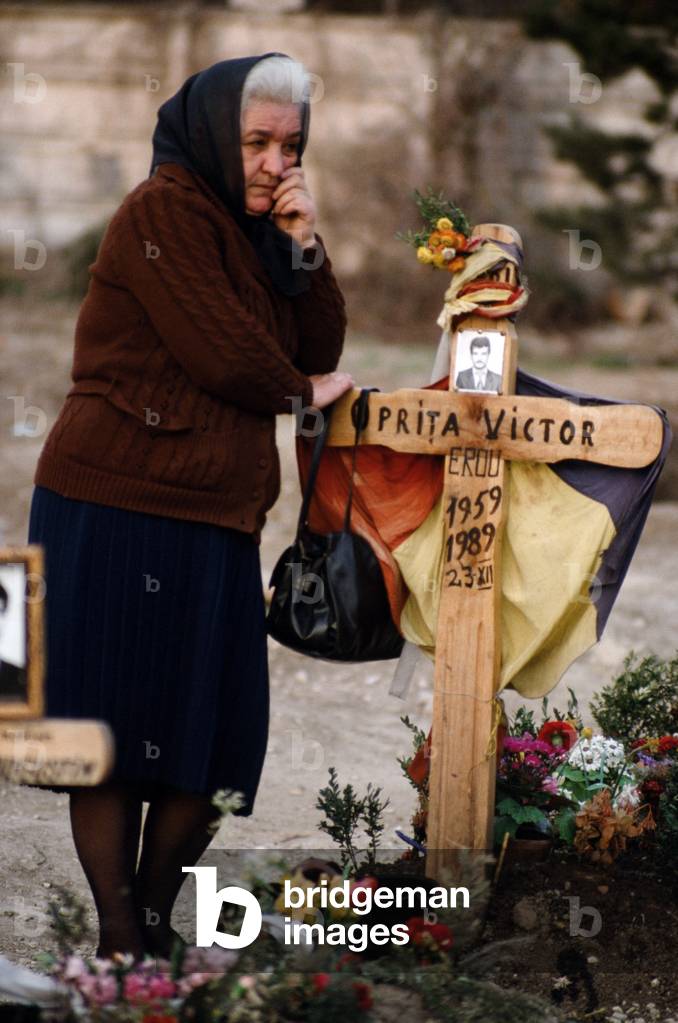 Old woman in a cemetery