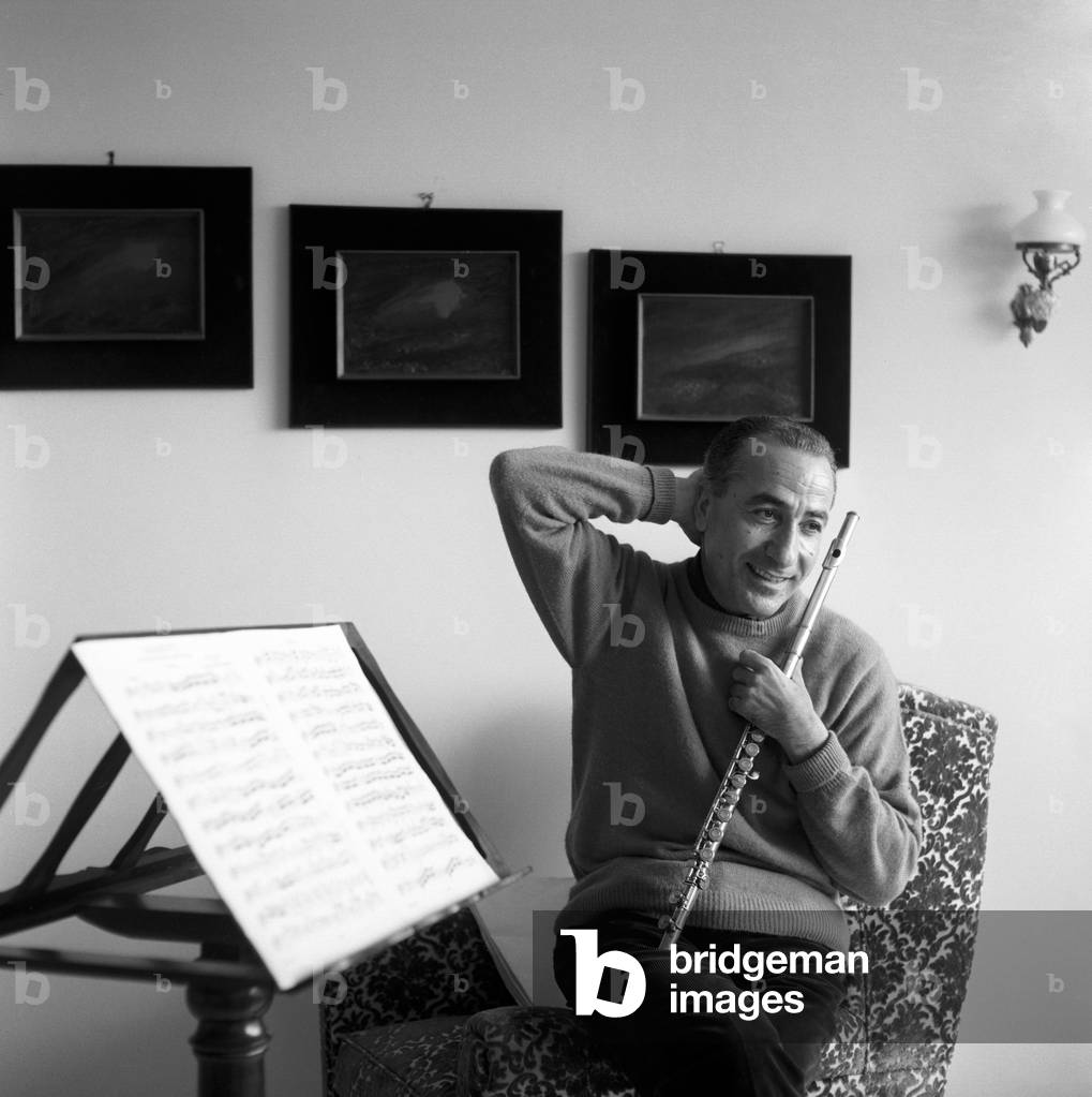 Severino Gazzelloni holding a flute, Rome, Italy, 1960